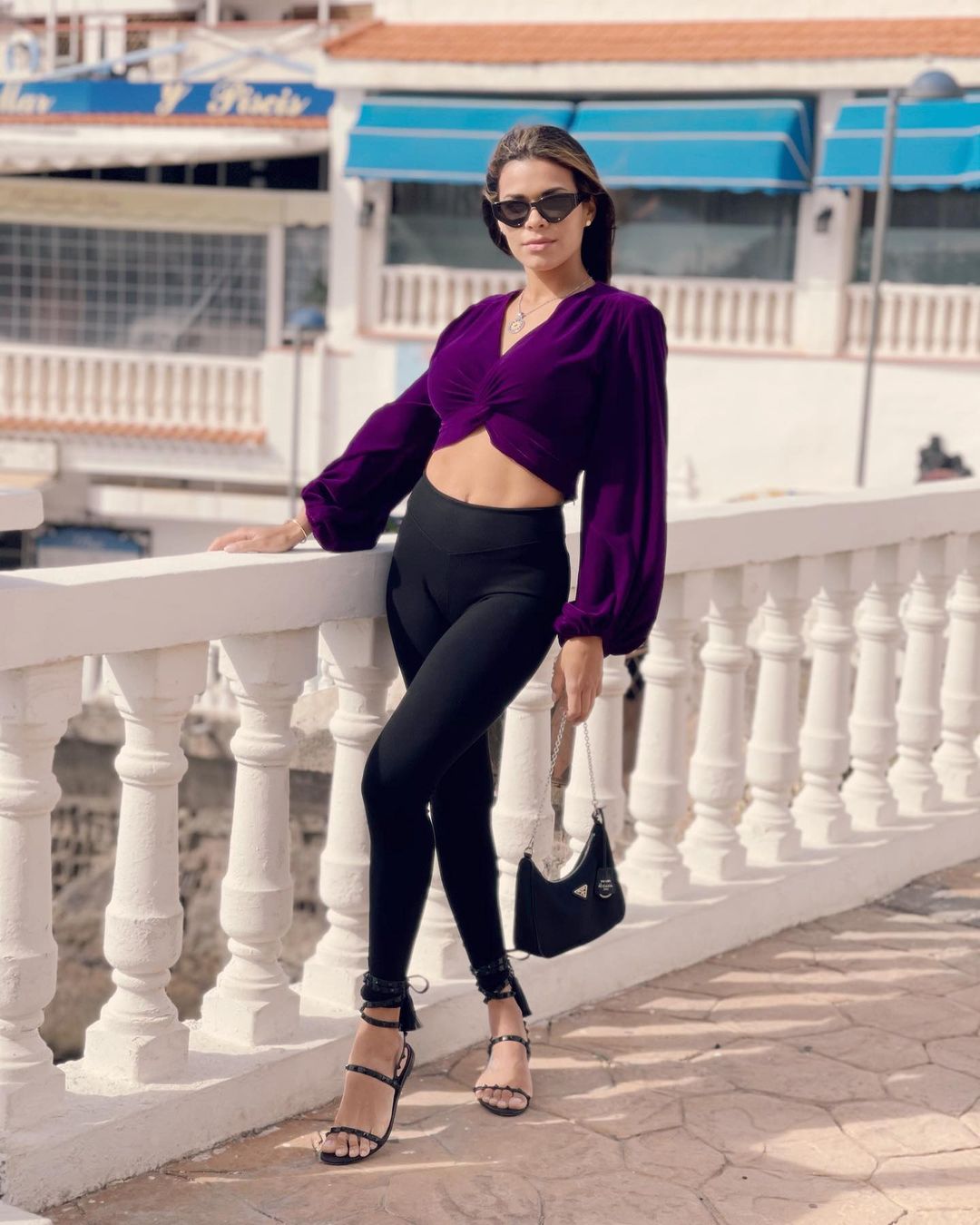 Luana Sandien in purple top and black trouser