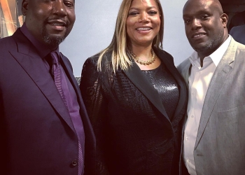 Shakim Compere with Queen Latifah and his partner