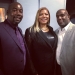 Shakim Compere with Queen Latifah and his partner