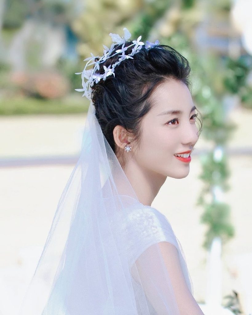 Wang Peng in Bridal look