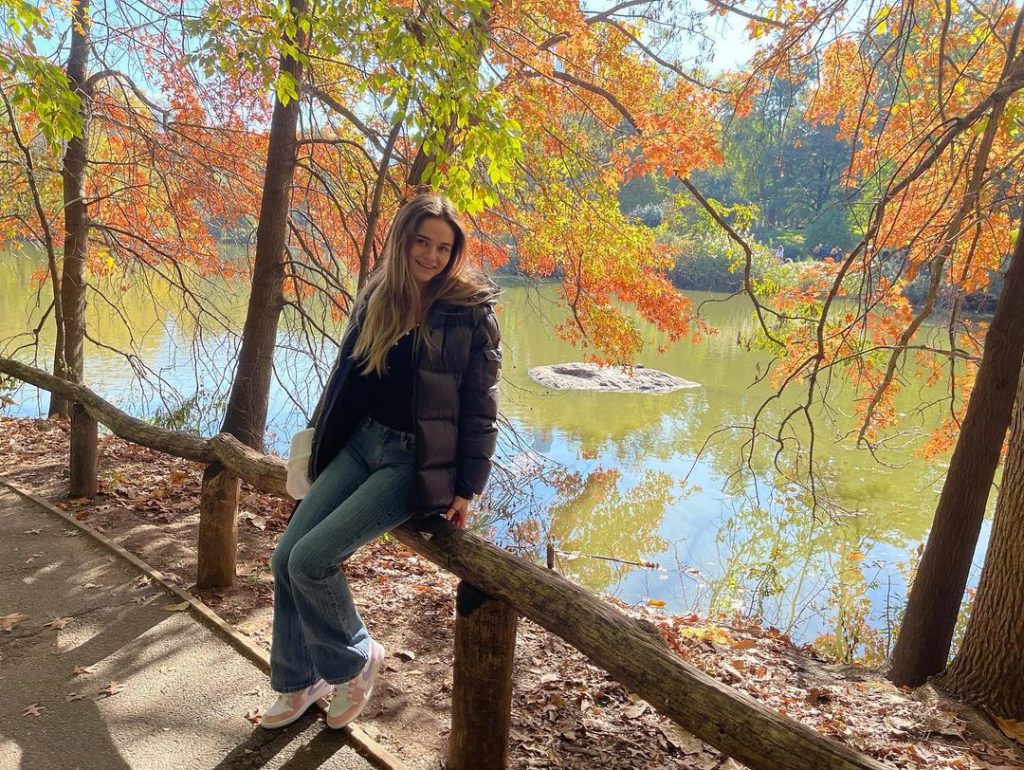 Megan Guthrie sitting in a park