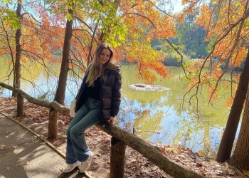 Megan Guthrie sitting in a park