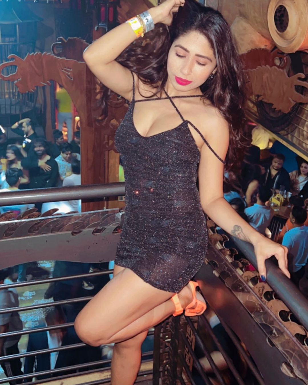 Angel Bhandari in black one piece party dress