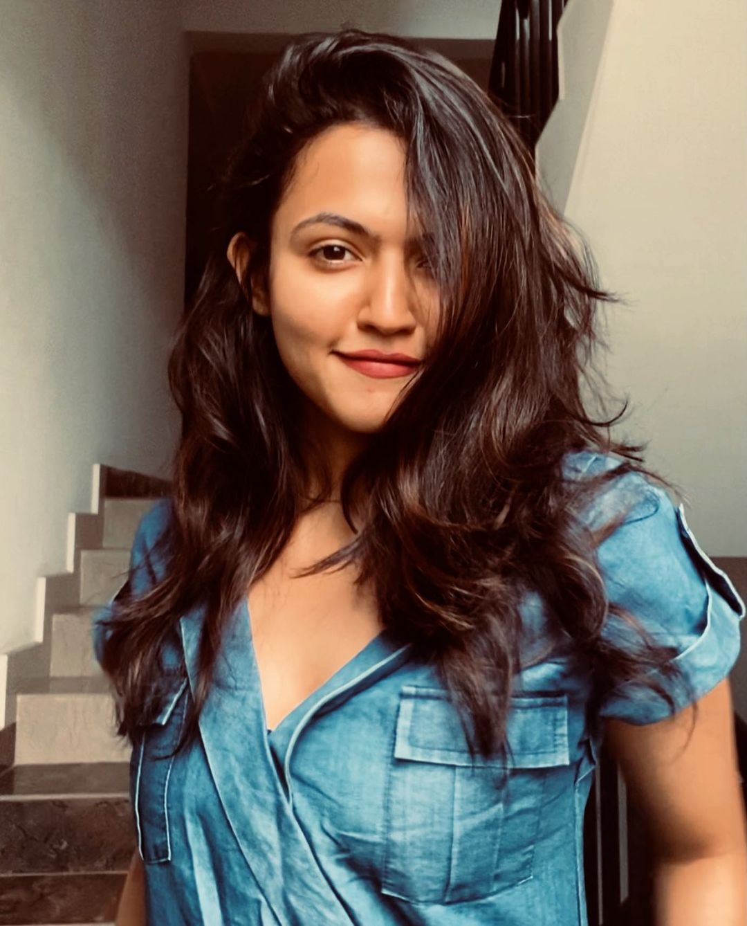 Aparna Das with open hair in jeans shirt