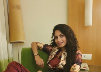 Khushee Ravi in maroon dress