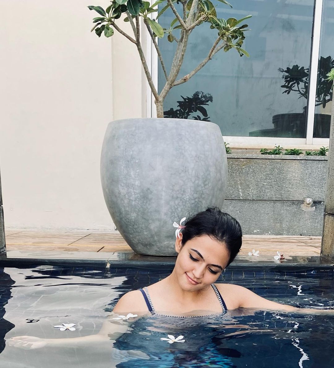 Aparna Das swimming in a pool