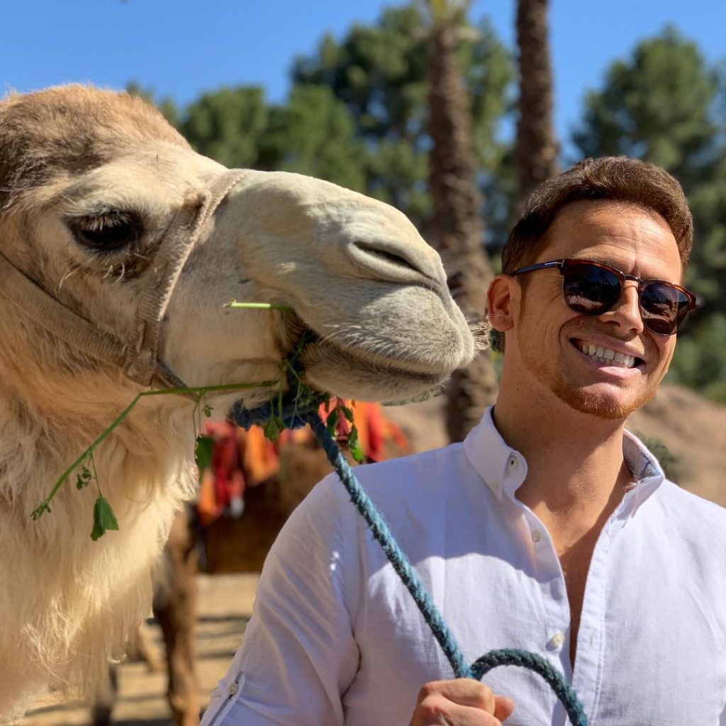 Joe Swash with a camel