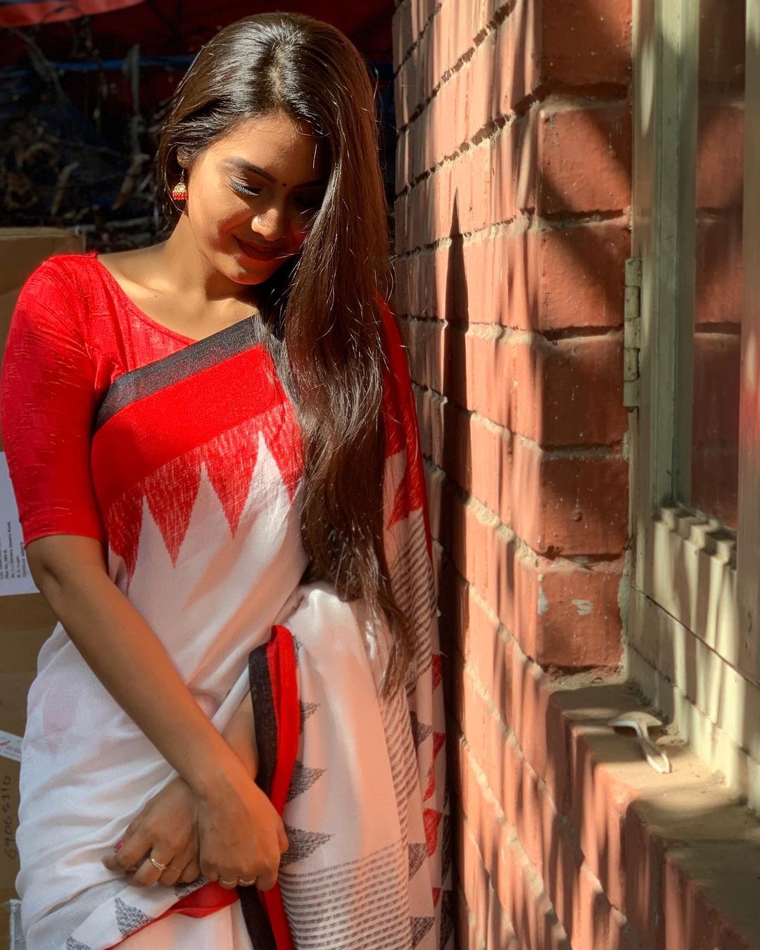 Pavithra Janani in Red & White Saree