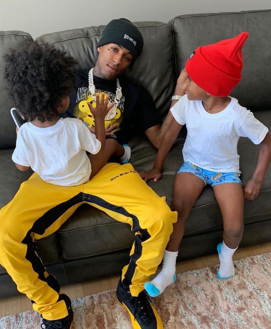 NBA YoungBoy with his two sons