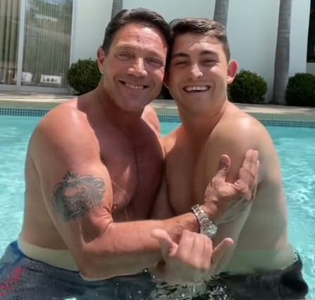 Carter belfort with his father Jorden Belfort in a swimming pool