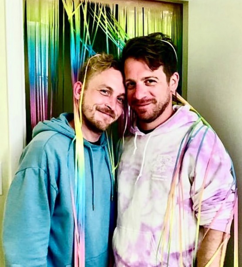 Richard Dibella and Robin Lord Taylor in colorful hoodies