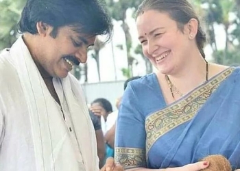 Pawan Kumar with his wife Anna Lezhneva in sky blue saree