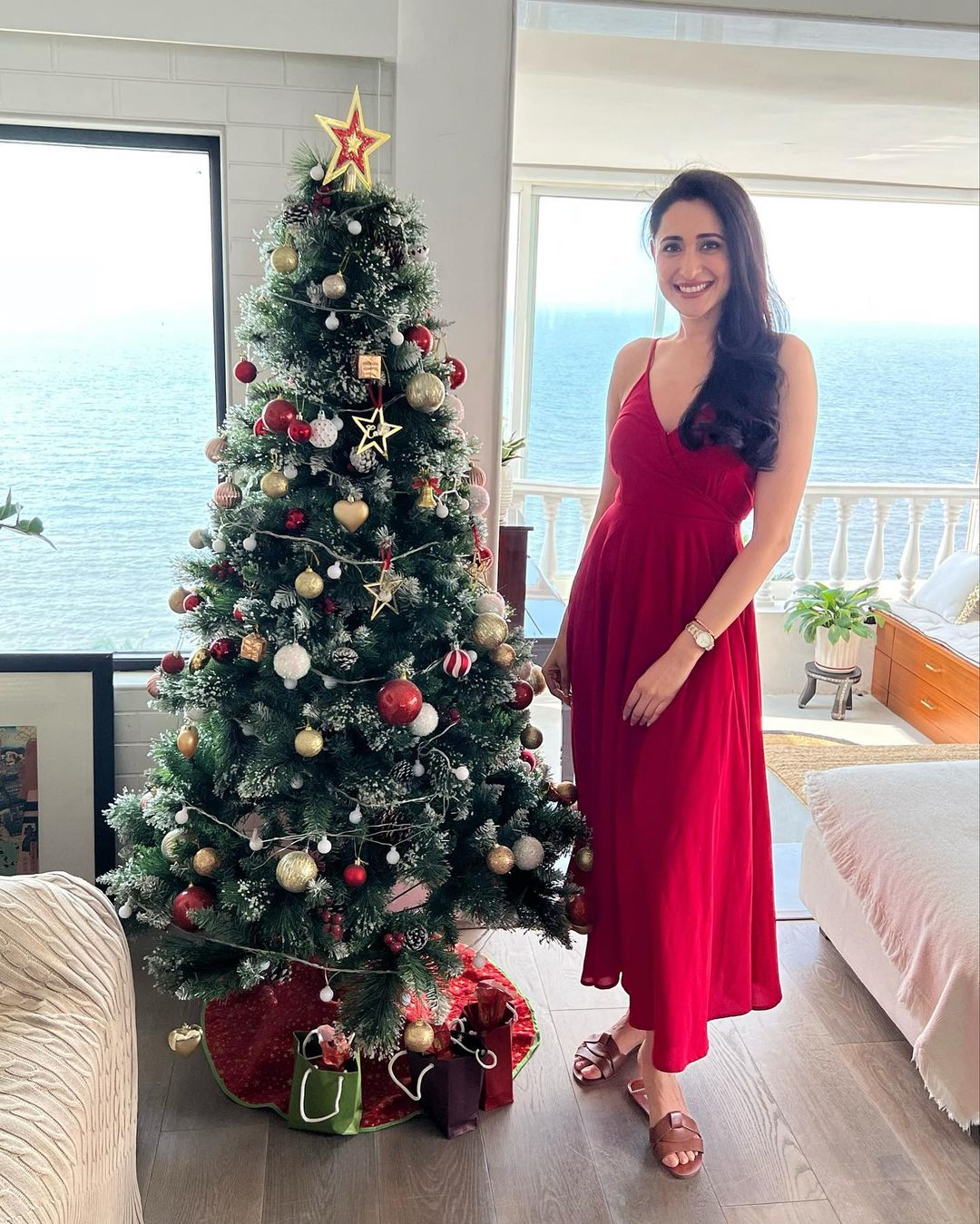 Pragya Jaiswal celebrating christmas in red dress
