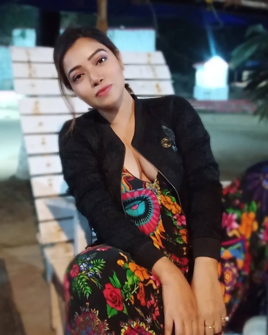 Rekha Mona in colorful dress and black jacket 
