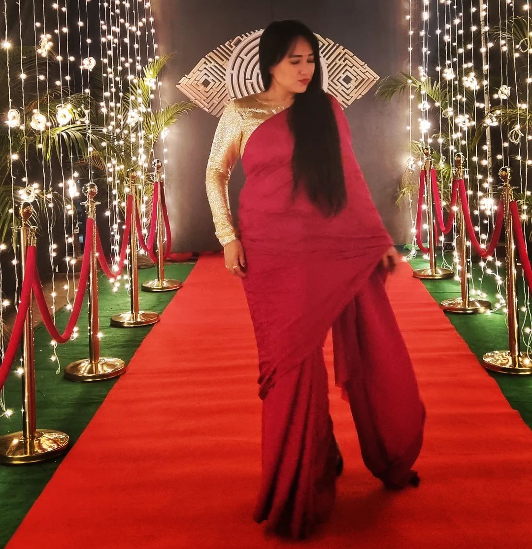 Anee Master at a function in red saree with golden blouse