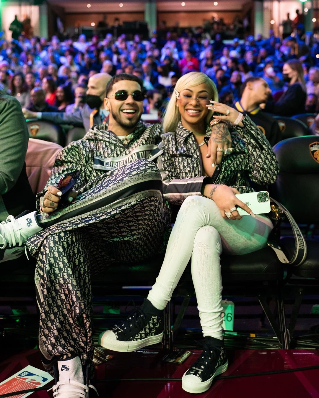 Anuel Aa with fiance Yailin la Mas Viral enjoying an event