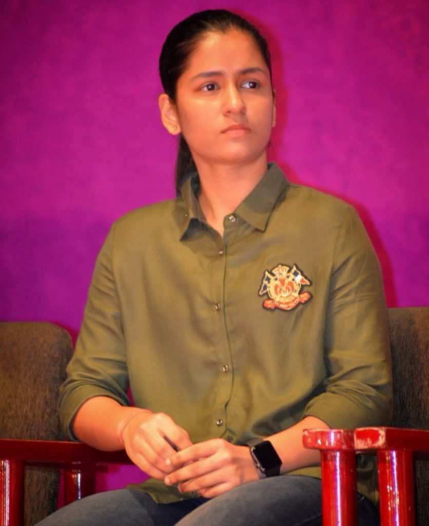 Naina Jaiswal in peanut color shirt