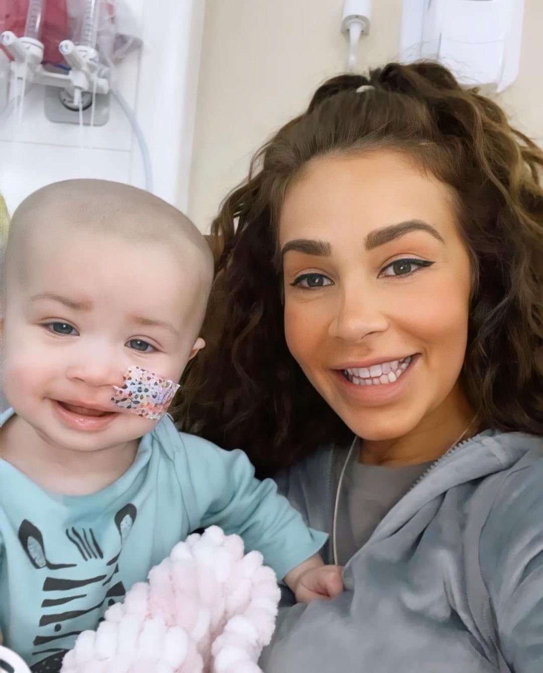 Ashley Cain's wife and daughter with smiling faces 