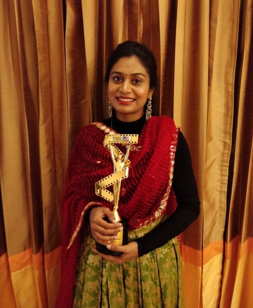 With an award